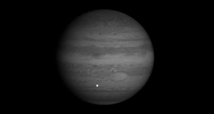 Picture of Jupiter and Europa, one of its moons.