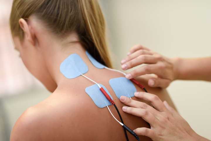 Scrambler Therapy involves placing electrodes around the area of pain. Credit: [Freepik](https://www.freepik.com/free-photo/electro-stimulation-physical-therapy-young-woman_1318981.htm).